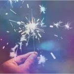Hand holding a sparkler