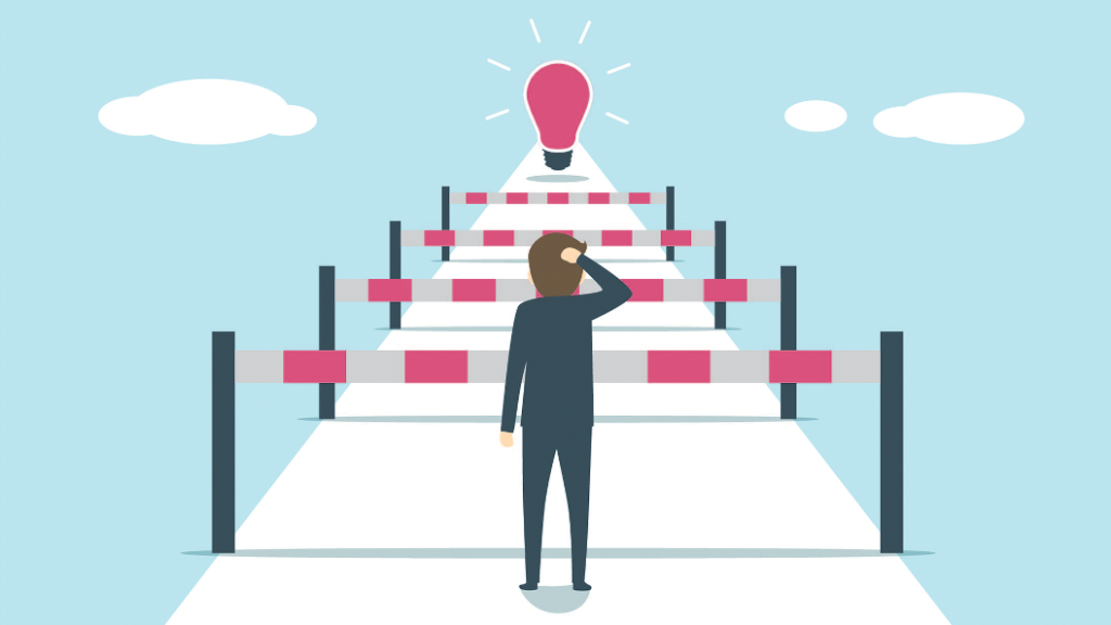 person facing obstacles with a light bulb idea behond
